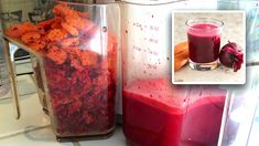 a blender filled with red liquid next to a container full of fruit and vegetables