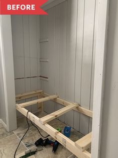 the inside of a house being remodeled with wood framing and tools on the floor in front of it