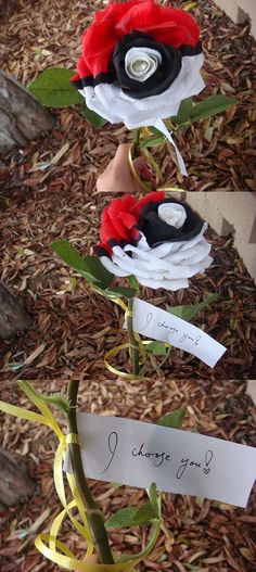 a hand holding a fake flower with a note attached to it