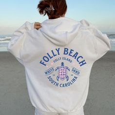 Folly Beach Sweatshirt Hoodie Our Folly Beach Sweatshirt is perfect for when the sun goes down this summer!  Show your love for Folly Beach, South Carolina, and gift yourself or someone special!  Sizing: *This is a unisex sized Gildan® brand crewneck sweatshirt.  *Please read the sizing guide carefully to ensure correct sizing.  *Measuring a favorite sweatshirt will help you find the correct size.  More about the sweatshirt: -50% cotton, 50% polyester -Loose fit -Sewn-in label -Unisex Sizing Tha Beach Sweatshirt, Folly Beach, Cute Sweatshirts, Beach Sand, Sew-in Labels, South Carolina, Sweat Shirt, Crew Neck Sweatshirt, Loose Fitting