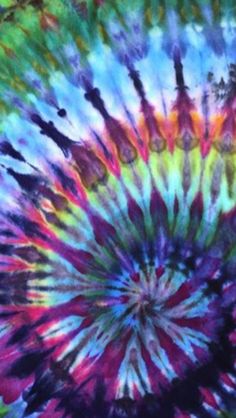 a colorful tie - dyed design is shown in the middle of this image, it looks like something from another world