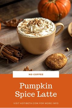 pumpkin spice latte in a mug surrounded by cinnamons