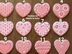 twelve heart shaped cookies arranged in different sizes and shapes on a wooden table with instructions for how to decorate them