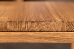 a close up view of the top of a wooden table