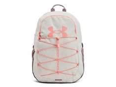 Under Armour Hustle Sport Backpack - Backpack Bags : White Clay/Tetra Gray/Aero Orange : Bring it all out on the field in the durable and vibrant Under Armour Hustle Sport Backpack. All Under Armour Apparel features a tagless design or tear-away tag with no left-over pieces. UA Storm technology delivers an element-battling, highly water-resistant finish. Backpack in a durable, water-resistant polyester. Large main compartment with zippered closure for your daily essentials. Soft-lined, padded sleeve for your 15 in laptop. Padded back panel with ergonomic shoulder straps for a comfortable carry. Front sleeve with bungee adjust pull cord for easily stashing a jacket, pair of shoes, or ball. Top carry handle. Tough, abrasion-resistant coated bottom panel for long-lasting wear. Volume: 29L (1, Sporty Hiking Backpack With Adjustable Straps, White Softback Backpack For Outdoor, White Softback Bag For Outdoor Use, White Softback Bag For Outdoor, Waterproof Sporty Bag For Back To School, Sporty Waterproof Back-to-school Bag, Sporty Waterproof Bag For Back To School, White Nylon Hiking Bag, White Waterproof Bags For Outdoor Activities