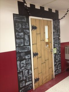 the door is decorated with black and white chalk paint on it's side wall