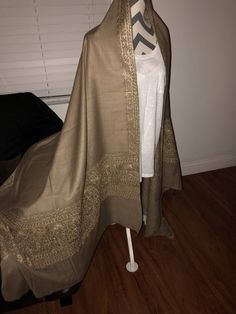 Beige Pakistani Shawl with Golden Border Elegant Beige Shawl For Festive Occasions, Elegant Beige Festive Shawl, Elegant Festive Beige Shawl, Gold Shawl For Fall, Elegant Gold Shawl For Winter, Festive Gold Pashmina Shawl, Gold Shawl For Formal Festive Occasions, Formal Festive Gold Shawl, Festive Gold Shawl