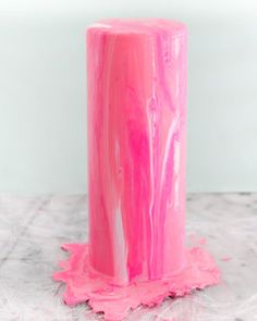 a pink object sitting on top of a table