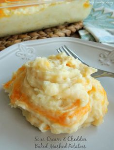 a white plate topped with mashed potatoes