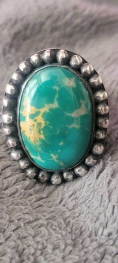 Here is a 100% hand made silver  Broken arrow green blue turquoise with a beautiful golden matrix thisstone is solid and not backed or color enhanced  it is all natural. This stone was cut in house and the ring was made in house all by hand currently it is a size 9 3/4 us , please specify size when ordering I can resize at no additional charge. Miriam Haskell Jewelry, Broken Arrow, Miriam Haskell, Rachel Green, Green Turquoise, Blue Turquoise, Turquoise Blue, Rings Statement, Matrix