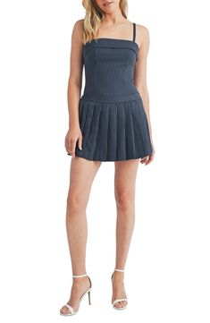 A sharply pleated skirt overlay adds to the preppy charm of this leggy romper covered in polished pinstripes. 25 1/2" center front length; 1" inseam; 26" leg opening (size Medium) Hidden side-zip closure Square neck Adjustable straps Lined 91% polyester, 9% rayon Hand wash, line dry Imported Fitted Preppy Tennis Skirt With Pleated Hem, Preppy Fitted Tennis Skirt With Pleated Hem, Fitted Pleated Mini Skort, Pleated Tennis Dress For Summer, Summer Tennis Dress With Pleated Skirt, Casual Fitted Tennis Skirt With Accordion Pleats, Spring Stretch Skort With Accordion Pleats, Stretch Skort With Accordion Pleats For Spring, Spring Pleated Short Tennis Dress