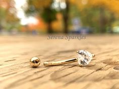 14k Solid Gold Belly Button, Barbell Belly Ring, Internally Threaded Navel Belly Ring, Curved Barbell Belly Ring, Heart Shape CZ Belly ButtonCare for your sensitive skin, Nickel free, HypoallergenicMetal: Solid GoldGemstone: Cubic Zirconia (American Diamond)Gold Purity: 14kStamp: 14k How to Close: Internally Threaded Screw OnBar Thickness: 1.6mm (14G)Total Length of Belly Button : 20mmTop Ball Dimension: 4mm Bar Length: 11mm (7/16")Stone size: 5mm••• Buying Options ••• 1) "Belly Button Jewelry" Ring Heart Shape, Gold Belly Button Rings, Button Heart, Belly Button Jewelry, Ring Heart, Eco Friendly Jewelry, Belly Ring, Button Jewelry, Diamond Gold