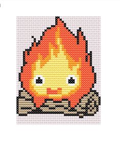 a cross stitch pattern with a fire on it