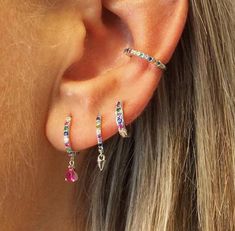 ✨Colourful earring stack silver huggie hoops and ear cuff earring set. This everyday silver earring stack are modern, original and minimalist, perfect to compliment a simple everyday outfit or for an occasion as well.  ✨Product specifications:  * Material: Sterling Silver with Zircon stone.  * Hoops Diameter (inner): 9mm.  * Ear cuff: 10mm ✨🎁FREE PERSONALISED GIFT POUCH TO ANY EARRING SET🎁✨ Select a gift pouch colour (lilac or cream - refer to the last photo for guidance) and make it your own Earing Stacks Silver, Multiple Ear Piercings Minimalist, Earring Stack Silver, Silver Ear Stack, Silver Earring Stack, Small Music Tattoos, Silver Earring Set, Stacking Earrings, Earring Stack