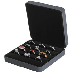 six rings in a black box on a white background