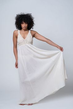 Bohemian Sleeveless Maxi Dress For Wedding, Bohemian Sleeveless Wedding Maxi Dress, White Sleeveless Dress For Destination Wedding, Traditional Lace Maxi Dress For Wedding, Traditional Lace Trim Dresses For Wedding, Bohemian Maxi Dress With Fitted Bodice, White Maxi Gown For Beach, V-neck Boho Wedding Dress, Bohemian Empire Waist Wedding Dresses