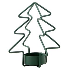 In search of a festive table decoration for a party, or a light for outside to enjoy the outdoors on a chilly night? Our 5in. green metal tree candle holder will give you the perfect mood lighting to compliment your holiday decor. Just add a pillar candle in your favorite holiday fragrance and enhance your Christmas theme with this charming metal wire tree candle holder. | Homespun Holiday Green Tree Candle Holder 5In | Christmas Indoor Decor | At Home, Metal Christmas Indoor Decor, Christmas Tree Candle Holder, Holiday Fragrance, Tree Candle Holders, Tree Candle, All Christmas, Christmas Tree Shop, Mood Lighting, Wire Tree