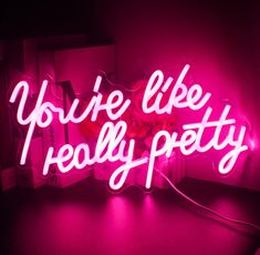 a neon sign that says you're like really pretty