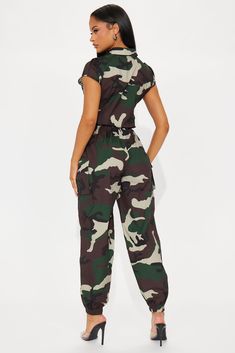 Available In Olive/combo. Jumpsuit Short Sleeve Collar Button Down Button Up Jogger Slight Stretch Disclaimer: Print Placement May Vary 100% Polyester Imported | Playing Straight Up Camo Jumpsuit in Olive Green size XS by Fashion Nova Casual Camouflage Jumpsuits And Rompers For Spring, Casual Camouflage Jumpsuit For Spring, Camouflage Jumpsuits And Rompers For Summer, Camo Jumpsuit Outfit, Fitted Camouflage Casual Jumpsuit, Military Style Long Sleeve Cotton Jumpsuits And Rompers, Military Style Long Sleeve Khaki Jumpsuit, Jumpsuit Short Sleeve, Camo Jumpsuit