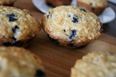 several blueberry muffins are sitting on the table