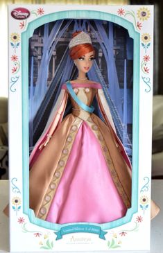 a barbie doll in a pink dress and tiara