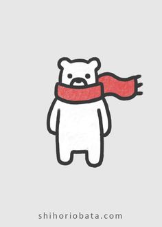 a white bear with a red scarf around its neck