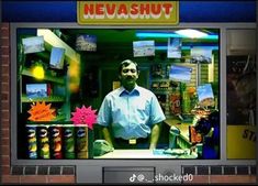 a man standing in front of a store window