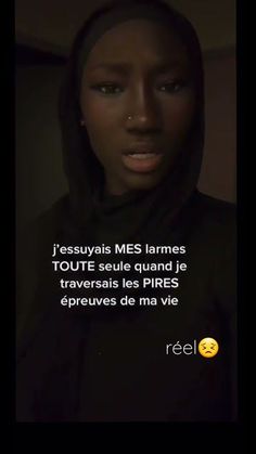 a woman wearing a black hoodie with an emotication on her face and the caption reads,'jesuyais mes les larmes farmers toute seule quand je traves des rives