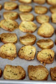 toasted pieces of bread sitting on top of a pan