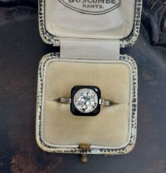 French #fine and #rare Art Deco Onyx and Old Cut Diamond Target Ring 💍 Central certified 2ct old European cut diamond within cushion shape onyx surround with micro diamond set shoulders in platinum. #artdecoring #targetring #clusterring #oldcutdiamond #oldeuropeancut #2carats #certifieddiamond #diamondcertificate