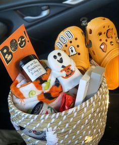 a basket filled with lots of halloween items