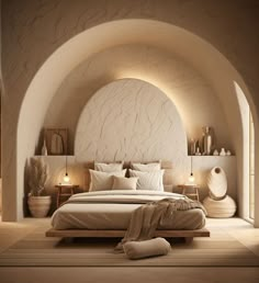 a large bed sitting in a bedroom next to an archway