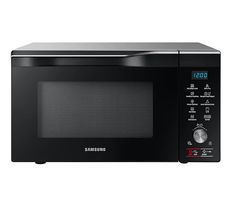 a black samsung microwave oven with the door open and timer on it's side