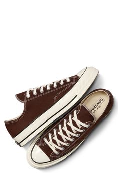 A 1970s icon lives on in an always-cool canvas sneaker that still sports its streamlined profile and glossy rubber cupsole inspired by the iconic original. Lace-up style Removable OrthoLite® insole Textile upper and lining/rubber sole Imported Brown High-top Canvas Sneakers With Vulcanized Sole, Converse Retro Sneakers With Contrast Sole, Retro Converse Sneakers With Contrast Sole, Vintage Converse Sneakers With Rubber Sole, Brown Canvas High-top Sneakers With Vulcanized Sole, Vintage Converse Sneakers With Rubber Toe Cap, Vintage Sneakers With White Vulcanized Sole, Brown Low-top Cotton Sneakers, Brown Cotton Low-top Sneakers