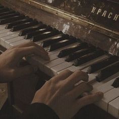 someone playing the piano with their hands