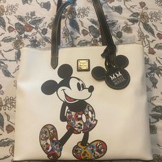 Never Used Disneys Mickey Mouse Through The Years Anniversary Bag! Disney Minnie Mouse White Bag, White Disney Bags For Everyday Use, White Disney Everyday Bag, White Disney Style Bag, Disney Style White Everyday Bags, Multicolor Disney Bag With Mickey Mouse Design, White Mickey Mouse Bag For Disney Fan Events, Disney White Bags For Disney Trips, Multicolor Disney Mickey Mouse Bag