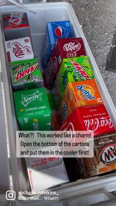 a cooler filled with lots of different types of drinks