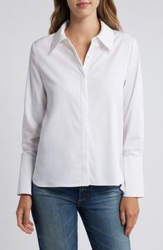 A covered placket and flared sleeve cuffs add a tailored touch to a staple shirt. 25 1/2" length Hidden-button placket Spread collar Long sleeves with flared, one-button cuffs 51% rayon, 45% polyester, 4% spandex Hand wash, dry flat Imported Classic Blouse With Fold Down Collar And Buttons, Classic Blouse With Spread Collar And Covered Buttons, Modern Long Sleeve Shirt With Cuffed Sleeves, Timeless Collared Tops With Buttons, Timeless Button-up Top With Buttons, Classic Tops With Buttons And Fold Down Collar, Timeless Tops With Buttons And Fold Down Collar, Timeless Shirt With Button Cuffs, Classic Spring Shirt For Work