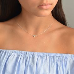 "Heart necklace,Choker necklace,gold heart charm,valentines gift,heart Jewelry,minimalist necklace,gold necklace,heart shape jewelry Cute gold necklace with a tiny heart charm hangs on a delicate 14k gold filled chain . This necklace is perfect for yourself, giving as a special gift. Necklace Measures Approximately 17\" Tiny heard bead- 7 mm Made from 14k gold filled or sterling silver . If you would like this chain altered, please convo me. All my jewelry are packed in an elegant gift box. If y Tiny Heart Minimalist Necklace, Minimalist Tiny Heart Necklace, Tiny Heart Necklace In Minimalist Style, Minimalist Tiny Heart Pendant Necklaces, Minimalist Tiny Heart Pendant Necklace, Minimalist Heart Pendant Charm Necklace With Delicate Chain, Tiny Sterling Silver Heart Pendant Necklace, Minimalist Sterling Silver Heart Necklace, Minimalist Sterling Silver Heart Charm Necklace