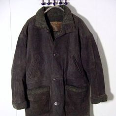 Vtg East West Rugged Leather Button Faux Shearling Ranch Coat Sz Xl . Acrylic Lined . Soft Leather Shell .Button Front . Aprox 27" Shoulders 24" Sleeves Rolled Out 27" Chest 35" Length Winter Leather Jacket With Buttons, Brown Fur Coat With Button Closure For Fall, Brown Winter Fur Coat With Button Closure, Winter Leather Long Coat With Buttons, Brown Buttoned Outerwear For Cold Weather, Winter Long Leather Coat With Buttons, Brown Fur Coat With Buttons For Fall, Rugged Winter Outerwear With Button Closure, Vintage Brown Fur Coat With Pockets