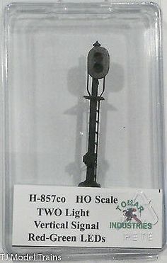 an old fashioned street light on display in a plastic package