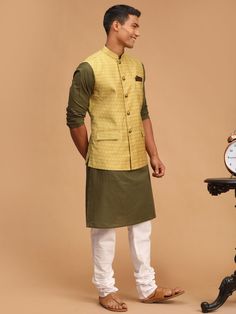 VASTRAMAY Men's Yellow Jacquard Nehru Jacket with Kurta Pyjama Set This elegant set includes a stylish yellow jacquard Nehru jacket paired with a matching kurta and pyjama, perfect for traditional and festive occasions. Designed with meticulous attention to detail, it ensures comfort and a sophisticated look. Key Features Yellow Jacquard Nehru Jacket Full-sleeve kurta with side slits Matching pyjama with drawstring closure Ideal for traditional and festive occasions Specifications Brand: VASTRAM Fitted Yellow Nehru Jacket For Festive Season, Fitted Yellow Nehru Jacket For Festive Occasions, Fitted Yellow Nehru Jacket For Diwali, Yellow Fitted Nehru Jacket For Diwali, Yellow Fitted Cotton Sherwani, Festive Fitted Yellow Nehru Jacket, Festive Yellow Fitted Nehru Jacket, Fitted Yellow Nehru Jacket With Long Sleeves, Churidar Material