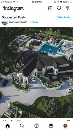 an aerial view of a mansion with a pool