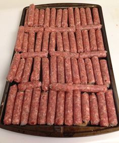 the sausages are ready to be cooked in the oven