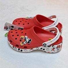 Brand New With Tags Attached Size : Women's Size 8 Comes With 1 Mickey Mouse And 1 Minnie Mouse Jibbitz As Pictured. Please See All Attached Pictures For Any Additional Details Casual Mickey Mouse Clogs With Round Toe, Red Closed Toe Synthetic Clogs, Mickey And Minnie Crocs, Casual Red Non-slip Clogs, Red Non-slip Casual Clogs, Red Non-slip Clogs With Round Toe, Red Low-top Mickey Mouse Sneakers, Red Slip-on Synthetic Clogs, Disney Mickey Mouse Low-top Sneakers