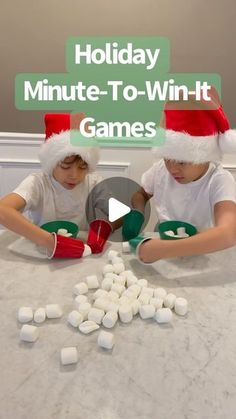 two children sitting at a table with marshmallows in front of them and the words holiday minute - to - wint games