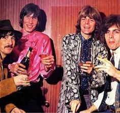 the rolling stones are posing for a photo together