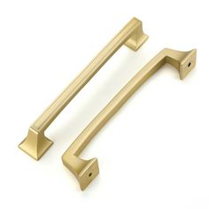 a brass door handle on a white background