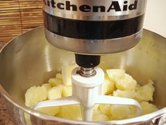 a kitchen aid blender filled with bananas