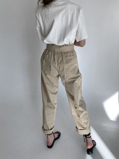 High waisted trousers with wide belted waist. Pin tuck details and gathering at waist. Short style. Model is in MINUSEY ONE SIZE. ✔️ Free worldwide express shipping over $100✔️ Loved by 6,500+ customers✔️ Limited edition collections, maximum style⠀⠀⠀⠀⠀⠀⠀⠀⠀Stay ahead of the trend with can’t-find-anywhere-else staples. Your closet will thank you 💕* MINUSEY ONE SIZE = EU 34-38, US 2-6* 100% Cotton* Dry clean* Made in Korea - Model Height: 172cm/5'7" (US2, EU34) Trendy Paperbag Waist Bottoms For Work, Trendy Belted Paperbag Waist Bottoms, Trendy Belted Bottoms With Paperbag Waist, Casual High-waist Pants With Pleated Waist, Casual High-waisted Bottoms With Pleated Waist, Casual High Waist Pants With Pleated Waist, Casual High Waist Bottoms With Pleated Waist, Casual Workwear Pants With Belt, Chic Paperbag Waist Pants With Belt Loops